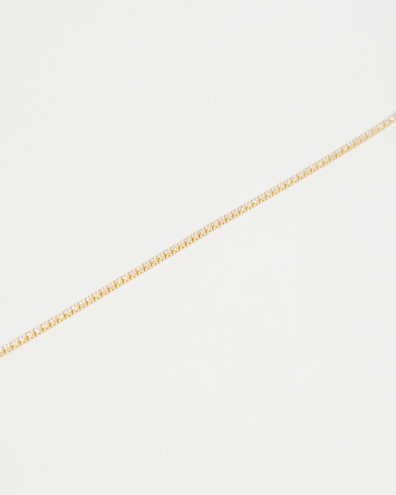 gold tennis bracelet