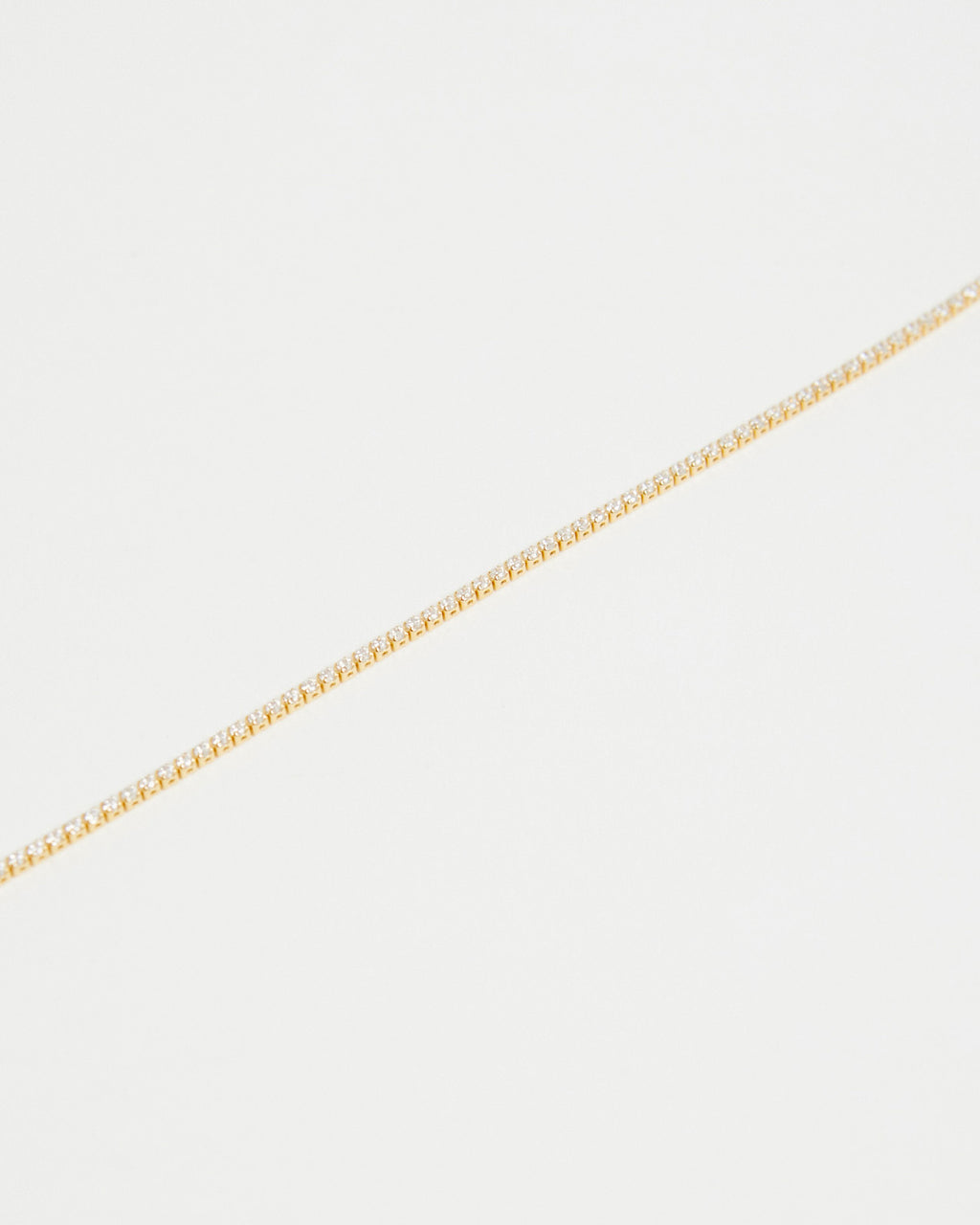 gold tennis bracelet